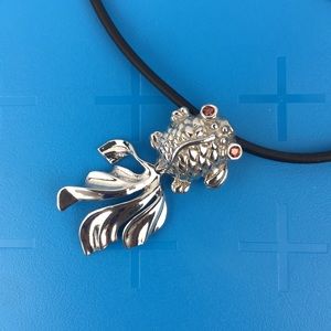 Silver Gold Fish pendant on black rubber necklace